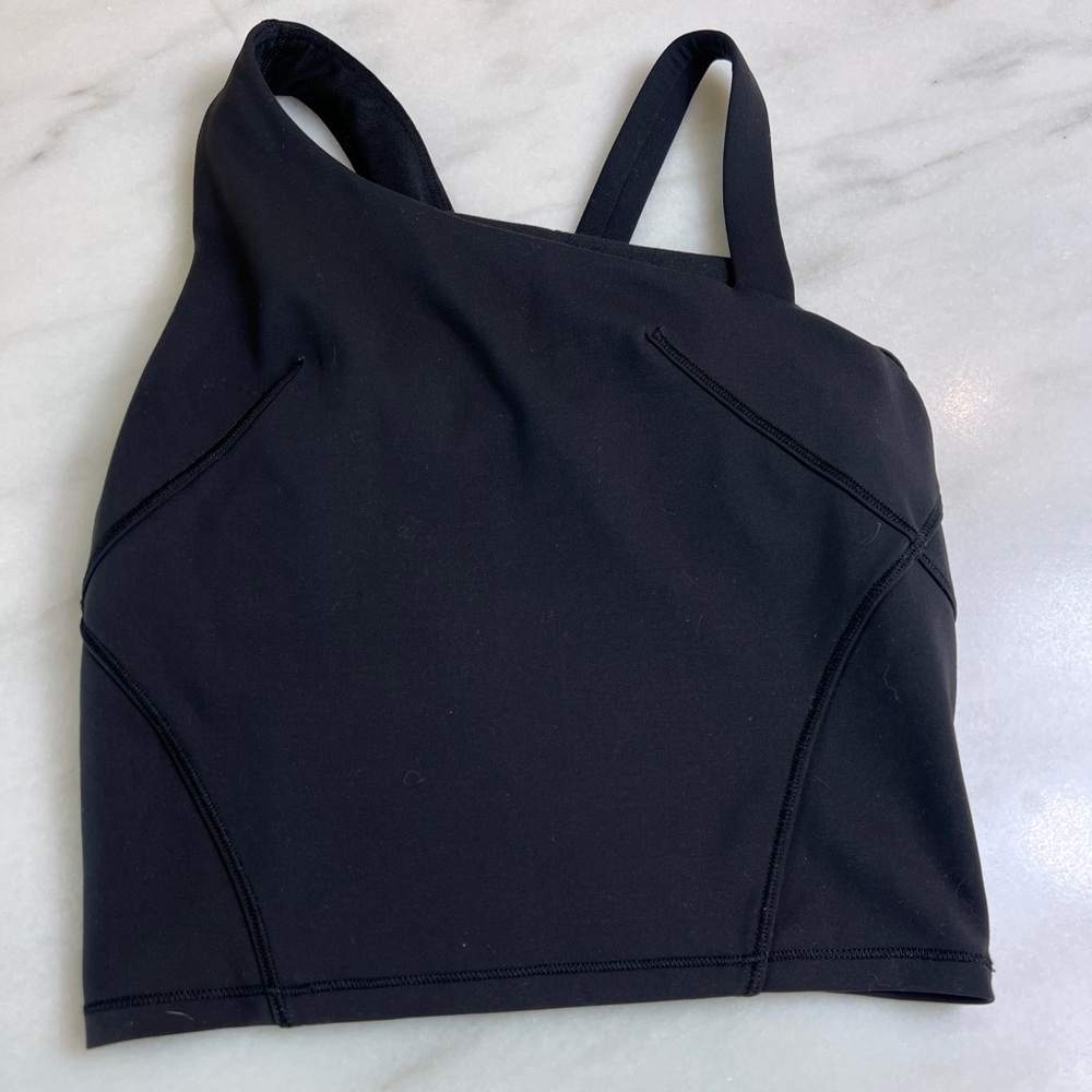 Lululemon Everlux Asymmetrical Tennis Tank Top
Black sz 0 guc